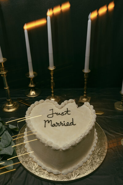 Heart-shaped 'Just Married' wedding cake.