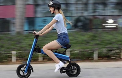Lady riding Blue Go-Bike M2, V&D Electric Bikes