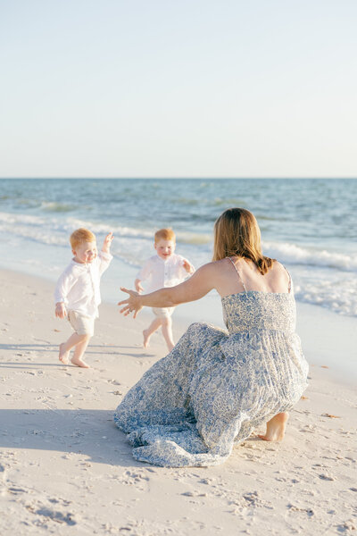 Family photography with young twins at Seagate Beach