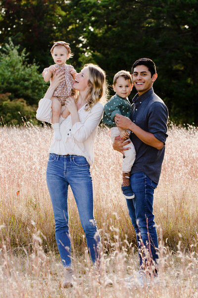 Family Pose In Wheat Field
