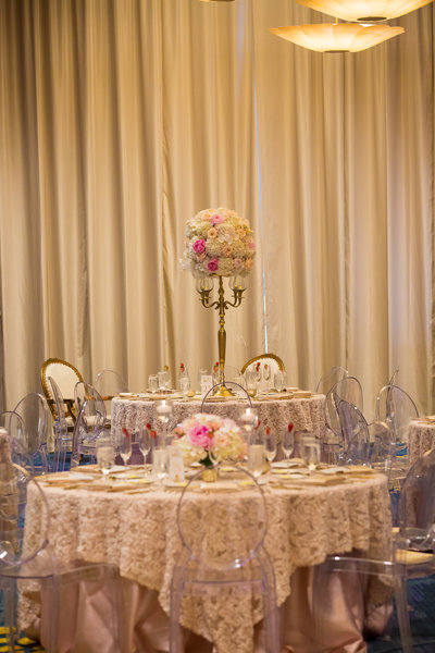 Beauty and the Beast Wedding at Opal Sands. clearwater wedding venue. Clearwater wedding planners. clearwater wedding photographers. blush and gold wedding. beauty and the beast. blush linens. gold chargers. ghost chairs.