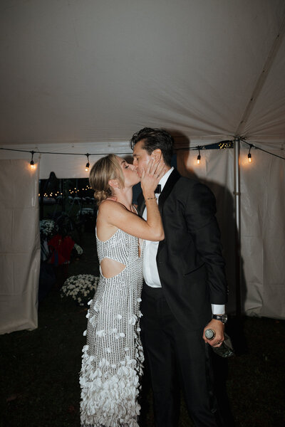 bride and groom joyfully sharing a kiss in indianapolis indiana