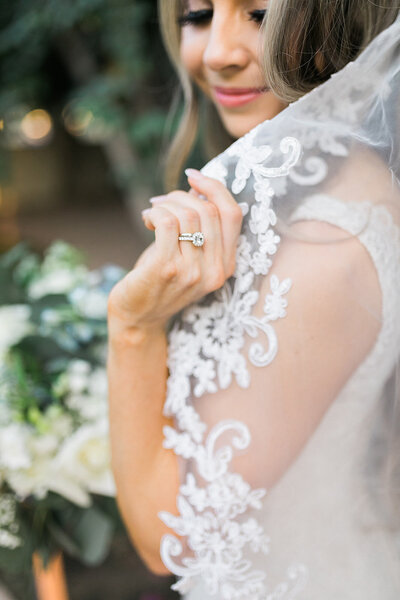 Close up of bride's veil and ring
