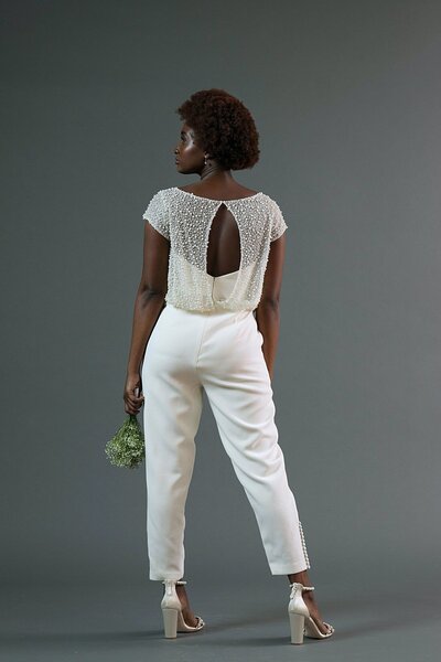 Link to more details and photos of the Jonah bridal jumpsuit by Charleston designer Edith Elan.