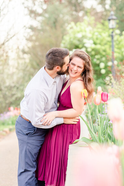 Photo of an engaged couple at the State Botanical Gardens of Georgia in Athens for their engagement session by Jennifer Marie Studios.