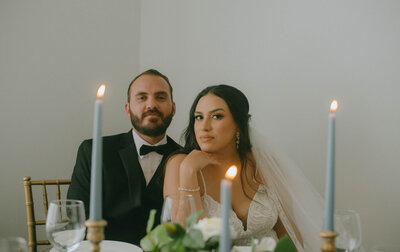Elegant Wedding couple portrait at dining table