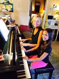 Laura Duncan Teaching Her Student Piano