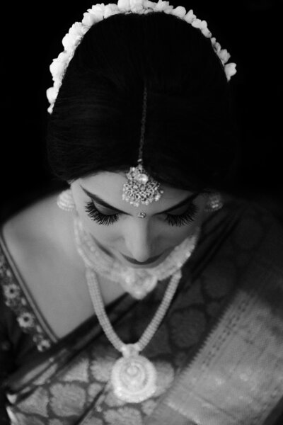 B & W Photo of the bride looking down - UME (New England Wedding Planners) were a wedding vendor