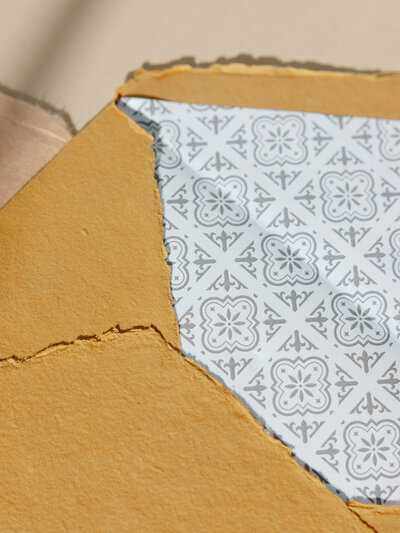 Mustard handmade paper envelope lined with patterned liner