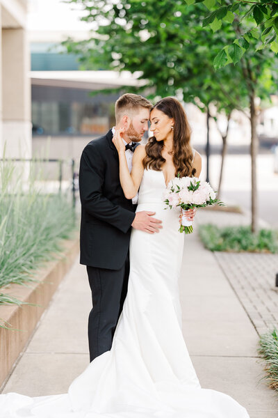 bride and groom with foreheads together by Knoxville Wedding Photographer, Amanda May Photos