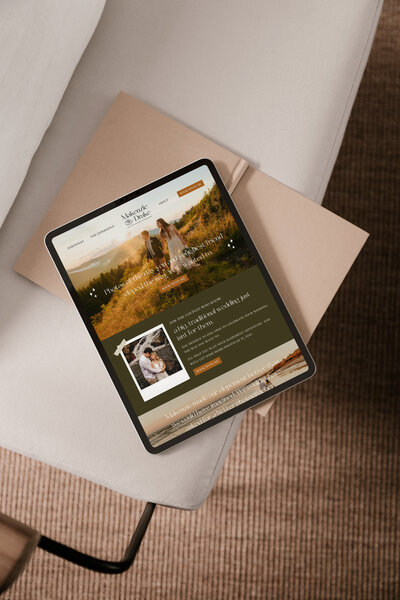 A website for an elopement photographer shown on an iPad