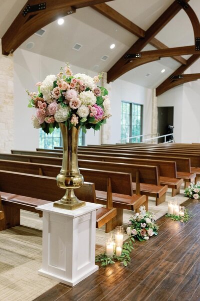 Pink and white floral arrangement at wedding ceremony | CM Promotions Wedding Planners Dallas Fort Worth and Beyond