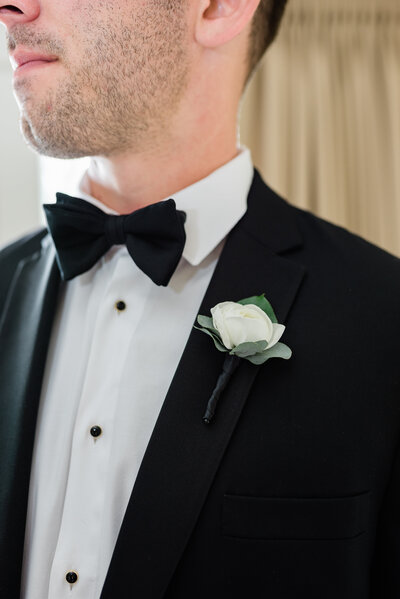 Details of groom's bowtie and flower