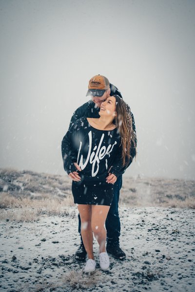 Man and Wifey snuggling in the snow