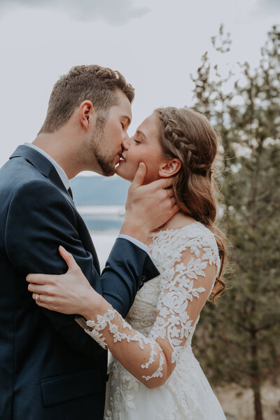 Okanagan Lifestyle Elopement Photographer Vernon British Columbia  Coldstream Kelowna Weddings Alberta Lake Lookout  Sunset Silhouette First Kiss