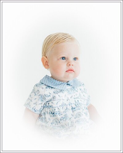 Color heirloom portrait of little boy's side profile.