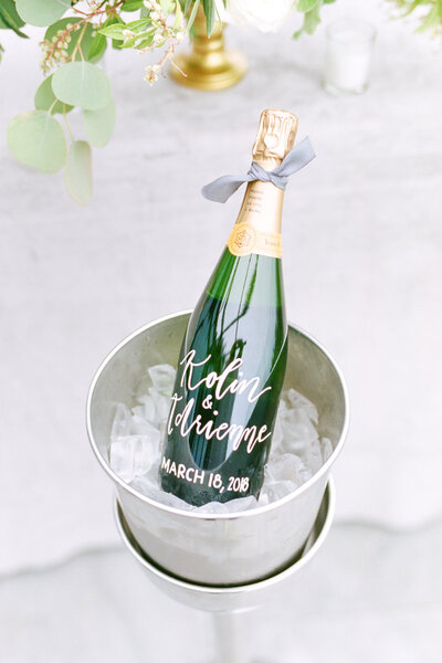 Calligraphy champagne bottle for a Charleston proposal