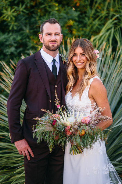 Smiling couple after their Palm Springs Wedding ceremony