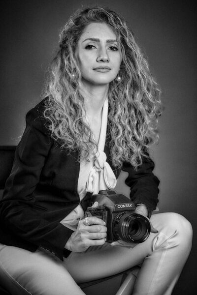 Photographer’s portrait with analog camera