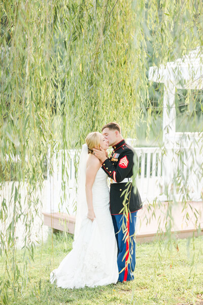 bride with military groom on wedding day