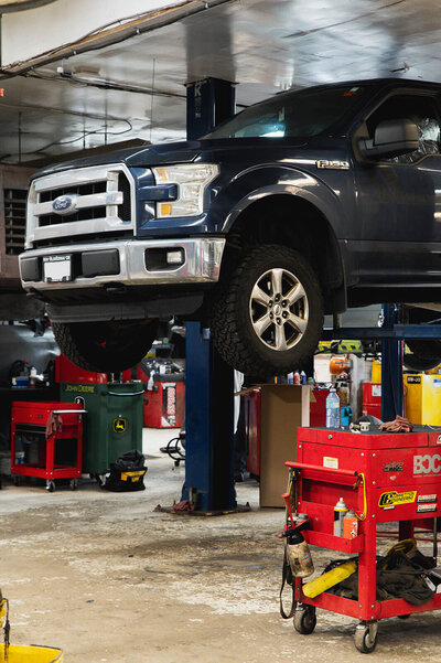 truck ford 150 pickup truck tires mechanic shop tool box hoist mechanic hoist front grill bumper bumper truck grill