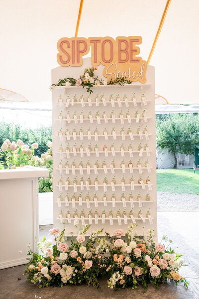 Sip To Be Seating Chart at wedding, Unique Melody Events & Design helped with wedding