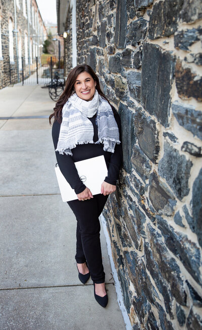 A-communications-consultant-poses-at-Artifact-Coffee-in-Hampden-Baltimore-Maryland-for-her-branding-photoshoot