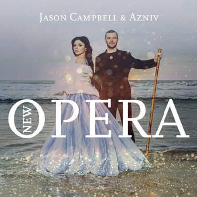 Album Cover New Age Opera Jason Campbell standing in water on beach holding tall wood flute Azniv standing beside him in pale blue ballgown shawl wrapped around shoulers