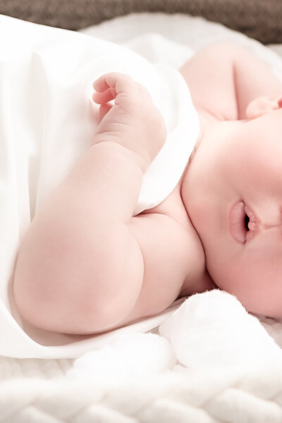A heartwarming newborn and family photography session in St. Louis, celebrating the joy of a growing family.