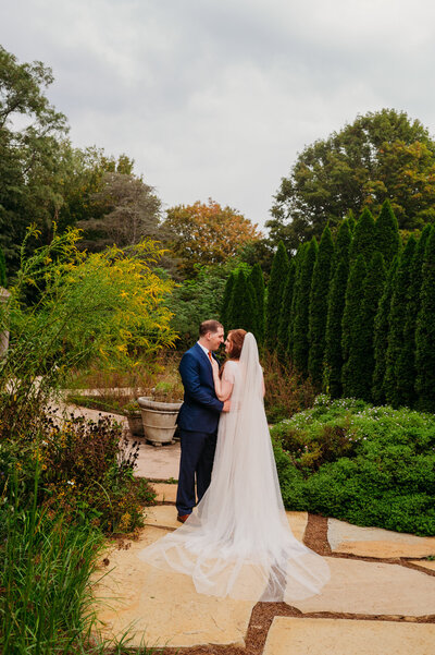 photo of bride and groom  in a garden