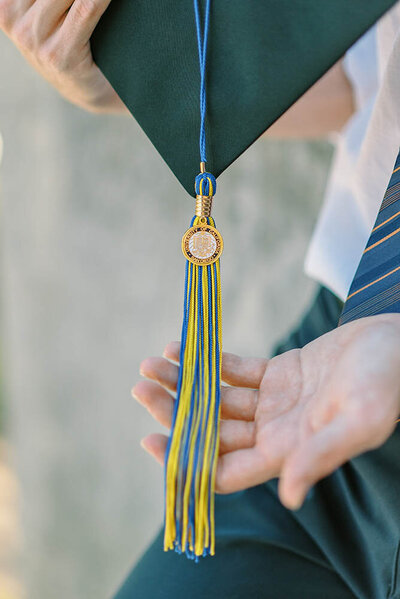 Closeup photo of a graduation cap and tassel