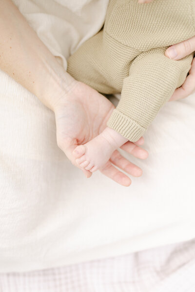 A close up of newborn baby foot neutral
