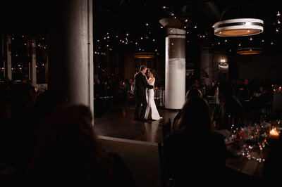 Bride and groom dance at River Roast in Chicago