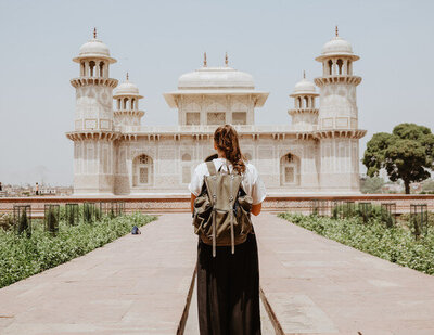 Woman carrying a backpack at Taj Mahal