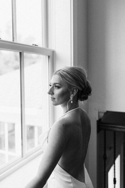 Profile of bride with pearl earring and classic updo