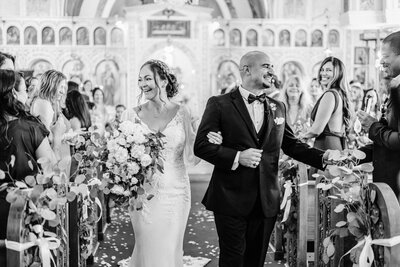 Palm Beach Wedding Photographer captures couple greeting guests
