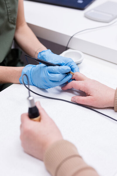 Grace administering a bioscan