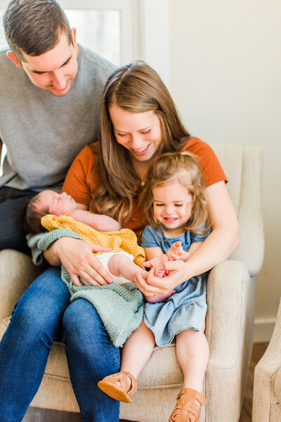 family of four newborn session