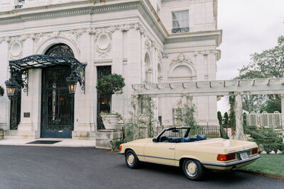 Classic car outside of wedding venue, Rosecliff Mansion Wedding