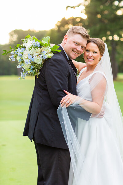 bride and groom touching foreheads