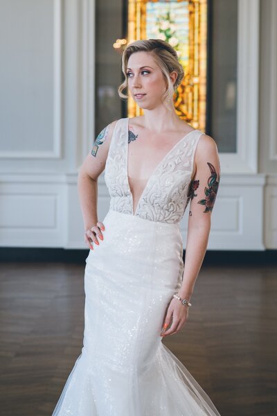 Link to more details and photos of the Faven sequin mermaid wedding dress style by indie bridal designer Edith Elan.