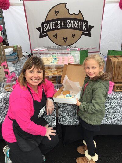 Sweets By Sarah K | Sarah with young customer
