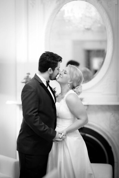 Black and white photo of classy newlywed couple