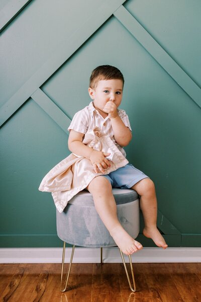 Young boy sucking his thumb