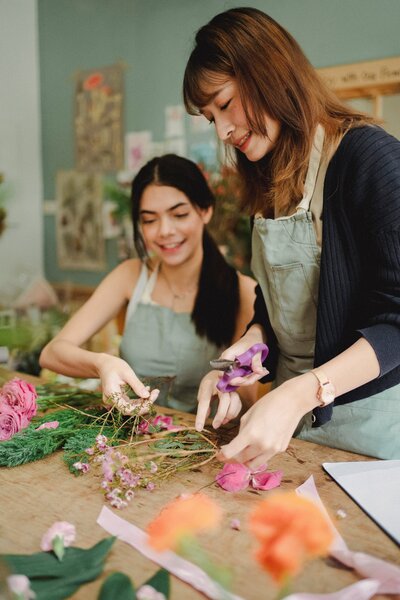 women cutting flowers