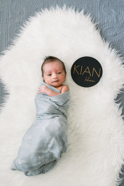In-home lifestyle Newborn Photo session, sibling love, taken in Mission Viejo, California