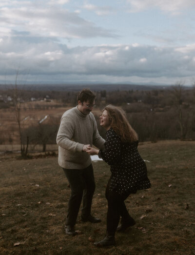 candid engagement photos at a castle in Mass