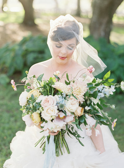 RiverOaks Wedding Bride with Colorful Spring Bouquet