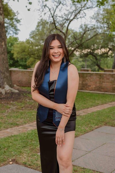 Stephanie poses for senior photos at Houston State University