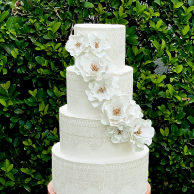 sugar flower cascade with white and gold open roses